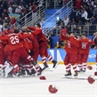 GANGNEUNG, SOUTH KOREA - FEBRUARY 25: Kirill Kaprizov #77 of the Olympic Athletes from Russia celebrates with teammates after scoring the 4-3 overtime gold medal winning goal against Germany at the PyeongChang 2018 Olympic Winter Games. (Photo by Andre Ringuette/HHOF-IIHF Images)

